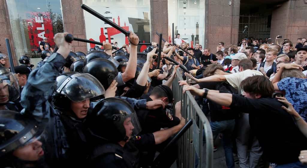 Russian police detain at least 94 including opposition leader Alexei Navalny at Moscow journalist protest