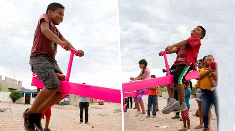 Pink seesaws enable play across Mexico-US border