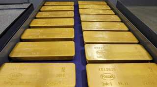 Gold flat as markets eye trade talk cues, Brexit deal