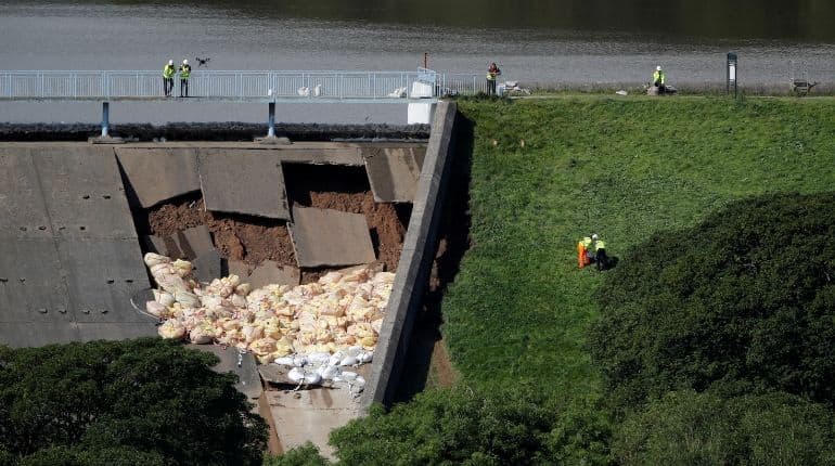 British town evacuated as dam disintegrates British town evacuated as dam disintegrates