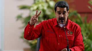 Venezuela government, opposition hold talks in Barbados as Maduro slams sanctions
