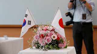 South Korea says will share military intel with Japan through US