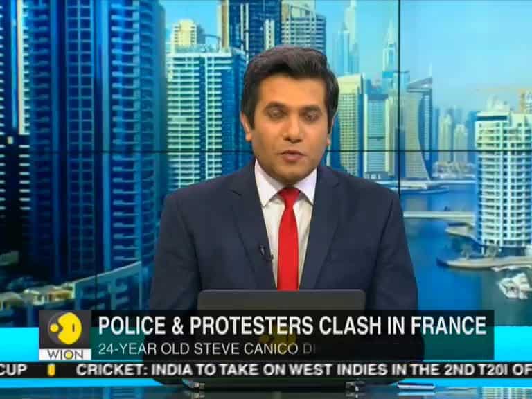 Police and protesters clash in France