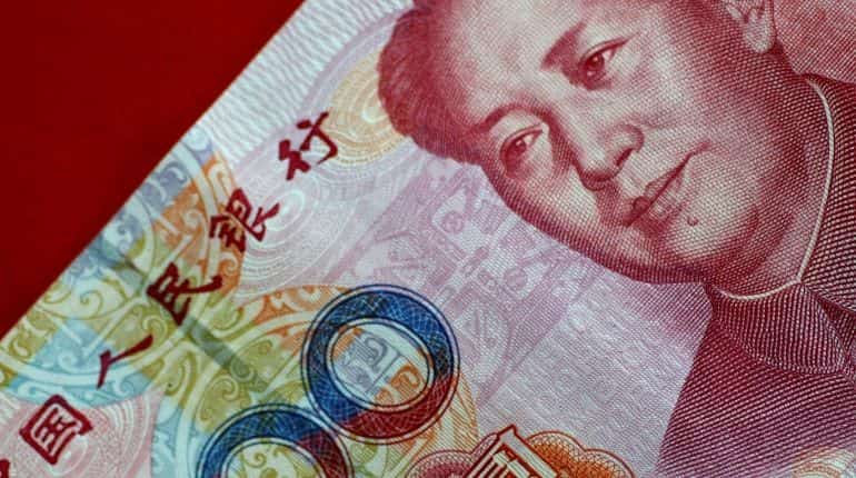 Chinese yuan falls to weakest level against the dollar since 2010