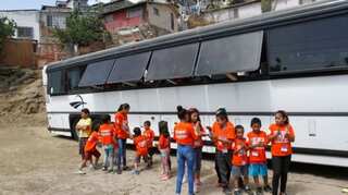 At US-Mexico border, a bus becomes a school for migrant children in limbo