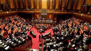Italy government wins a confidence vote on decree targeting migrant rescue ships