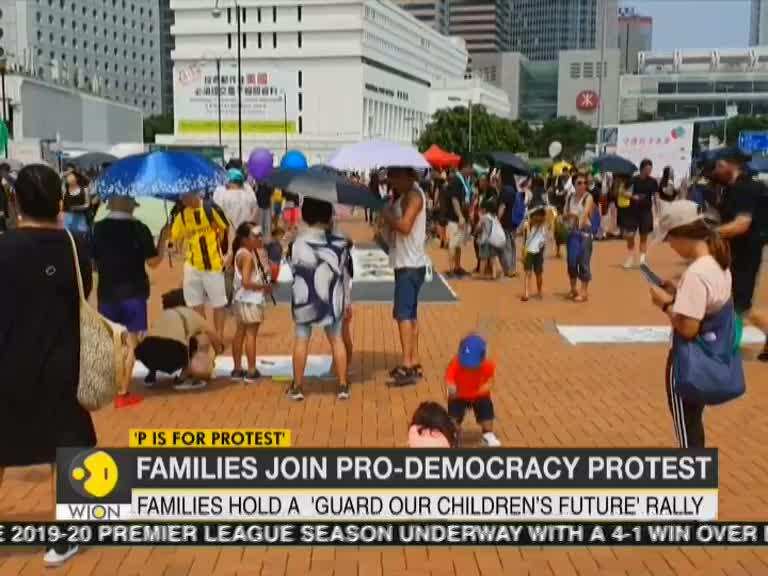 Hong Kong: Several families join pro-democracy protest