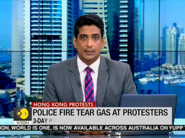 Hong Kong: Police fire tear gas at protesters