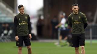 Two charged over security incident linked to Arsenal duo