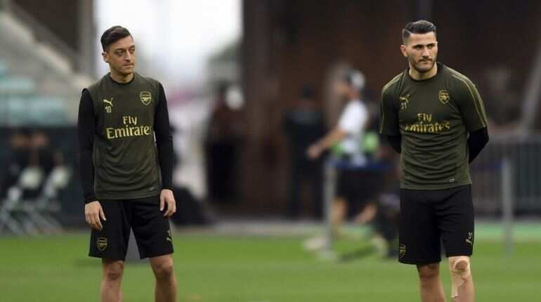 Two charged over security incident linked to Arsenal duo