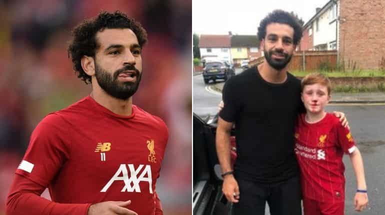 Mohamed Salah cheers up young fan who broke his nose trying to see him Mohamed Salah cheers up young fan who broke his nose trying to see him