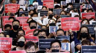 Stranded passengers voice support for Hong Kong protesters