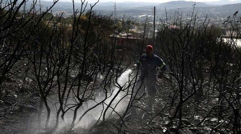 Wildfire rages on Greek island Evia, smoke reaches Athens Wildfire rages on Greek island Evia, smoke reaches Athens