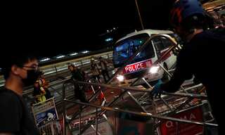 Bruised but unbowed Hong Kong police say no need for China intervention