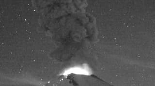 Mexico's mighty Popo volcano blows under starry night sky