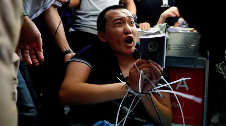 Watch: Violence at Hong Kong airport as police and protesters clash