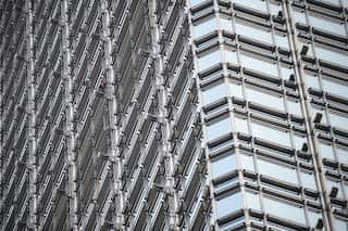 'French Spiderman' scales Hong Kong skyscraper with 'peace banner'