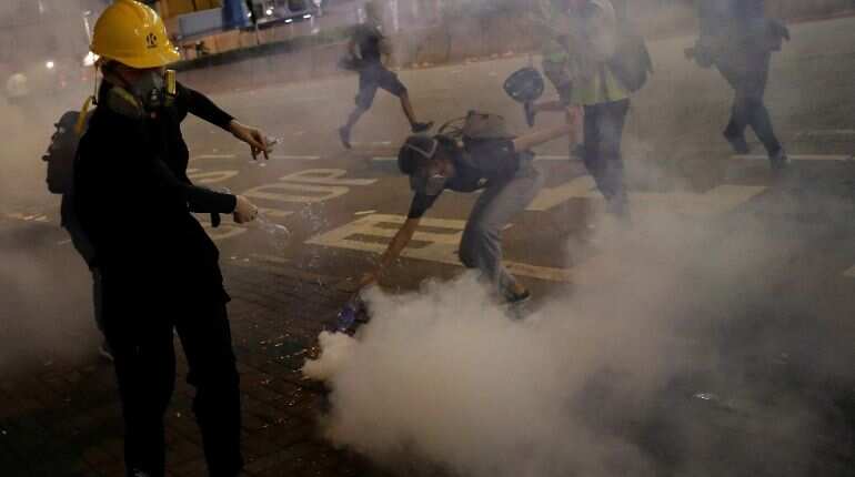 Hong Kong protests spread to subway as bank warns of economic fallout