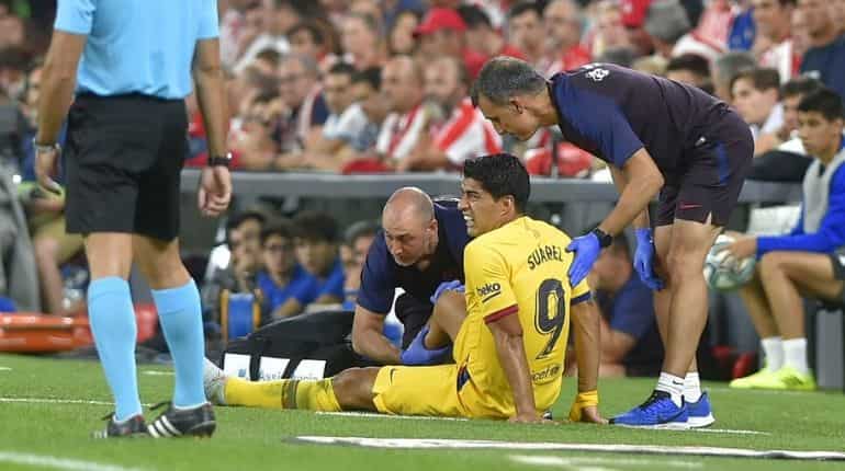 Barcelona confirm Suarez suffered leg injury in La Liga opener Barcelona confirm Suarez suffered leg injury in La Liga opener