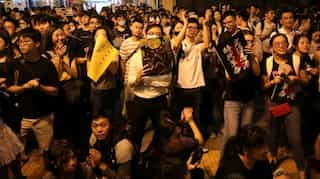 Thousands take to streets with rival rallies as Hong Kong's divisions deepen