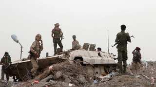 Saudi-led coalition fires flares over Yemen's Aden, separatists quit some posts