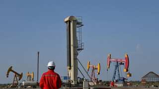 Building set on fire in protest against China's CNPC in Peru