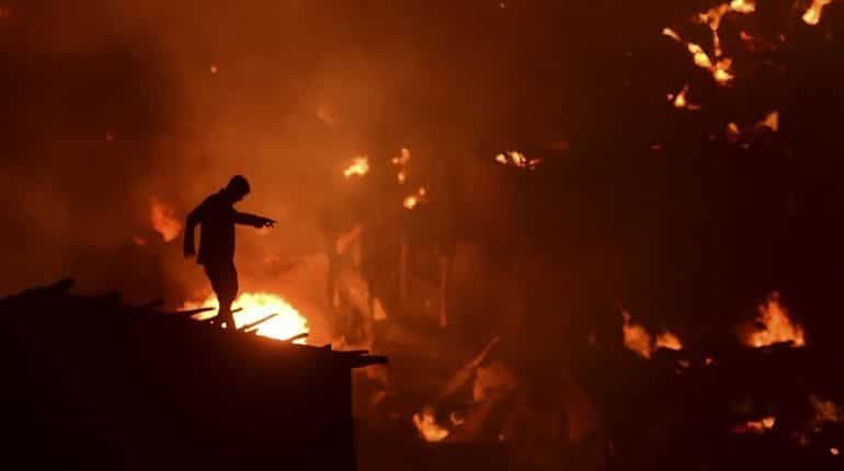 At least 10,000 homeless after fire razes Bangladesh slum