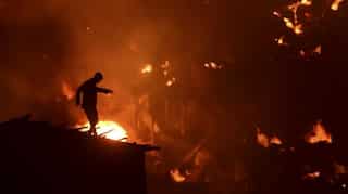 At least 10,000 homeless after fire razes Bangladesh slum
