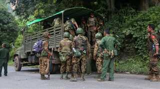Myanmar anti-coup fighters retreat from town as US makes appeal 