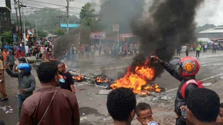 Indonesia president urges calm after violent protests in Papua cities