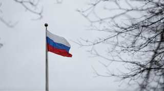 No Russian flags at memorials on WW II anniversary, rules Berlin court