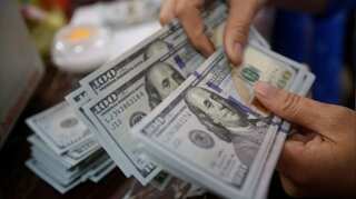 Dollar, yen fall as global tensions ease