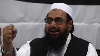 Pakistan court suspends jail term of two JuD men