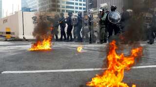 Hong Kong police use tear gas to counter protest petrol bombs