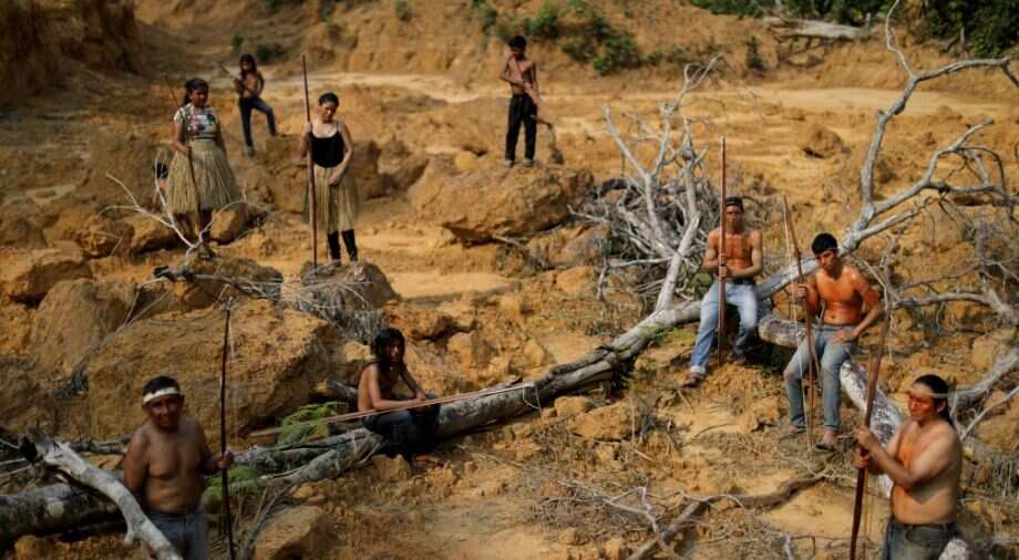 Brazil's indigenous people swear to fight for Amazon 'to last drop of blood'