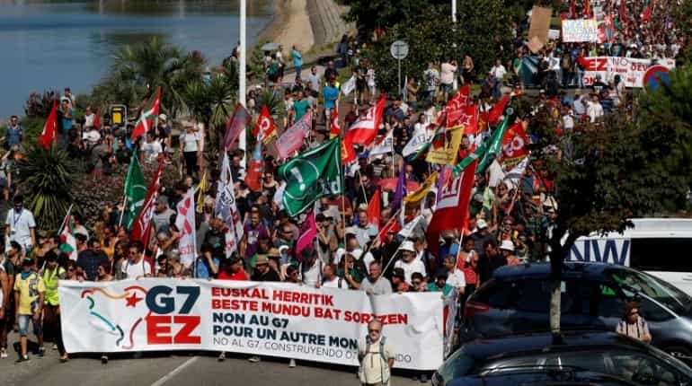 Protesters march near Biarritz demanding action from G7 leaders Protesters march near Biarritz demanding action from G7 leaders