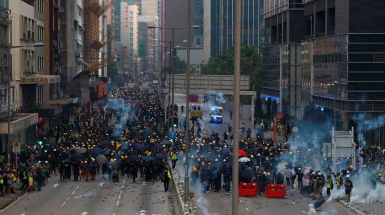 Hong Kong police arrest 29 after overnight clashes, more protests planned