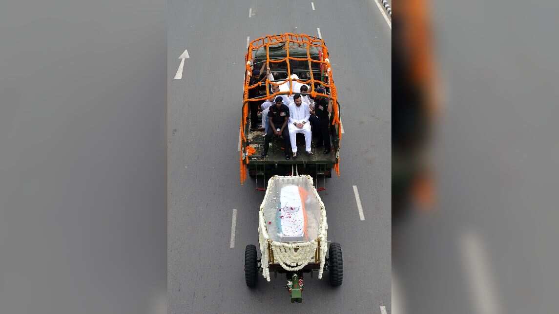 Vehicle adorned with white flowers
