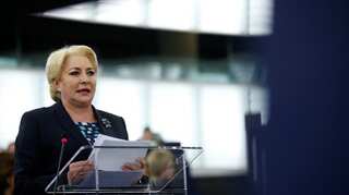 Romania's liberals present minority government