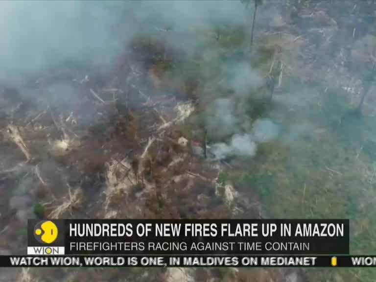 Hundreds of new fires flare up in Amazon