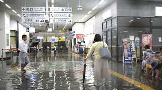 Life-threatening rains in south Japan kill two, emergency warning issued