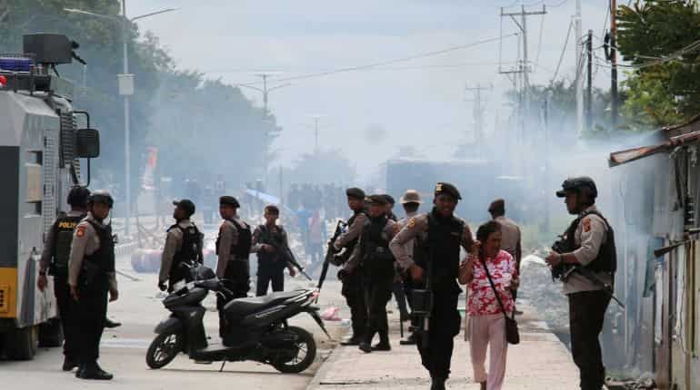 Rioters torch buildings as chaos erupts again in Indonesia's Papua
