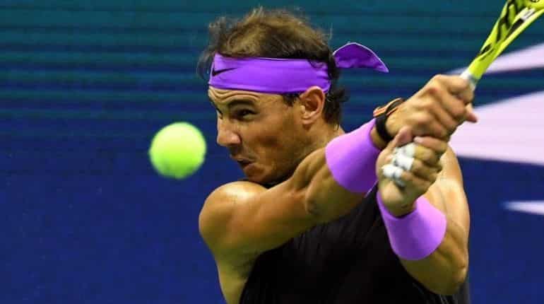 Nadal advances by walkover