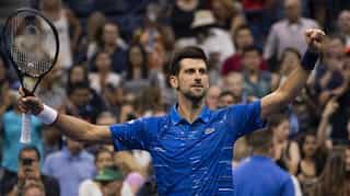 Djokovic shrugs off injury to win NY opener