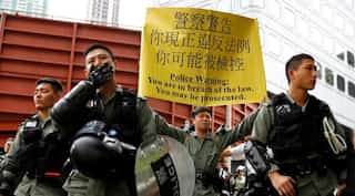 Hong Kong police fire tear gas, water cannon to disperse protests