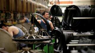 China's factory activity shrinks for fourth month as trade woes deepen