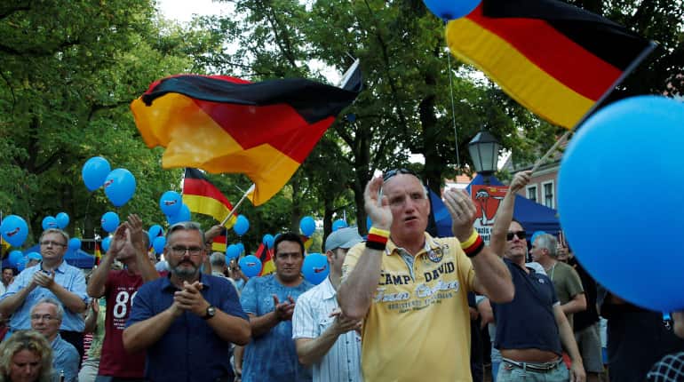 'Earthquake' elections in east Germany could jolt Merkel's coalition