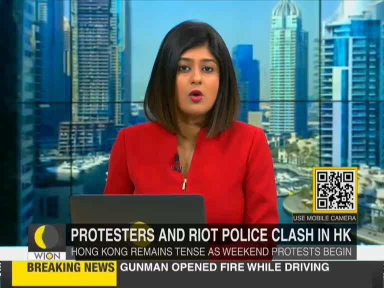 Hong Kong protests: Protesters set fire to barricades