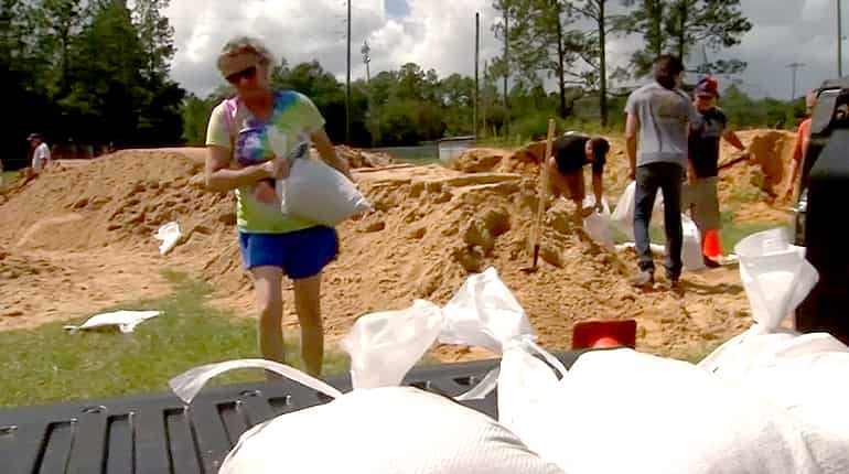 Florida residents fill sandbags, board up as Hurricane Dorian spins up to category 5