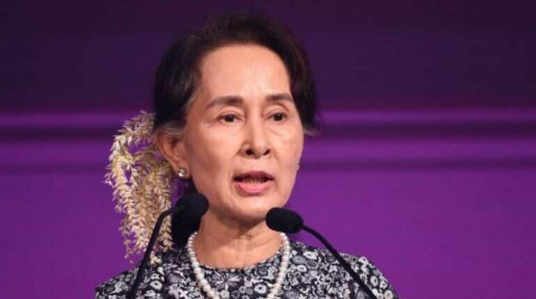 Ahead of Xi's visit to Myanmar, Suu Kyi makes rare trip to China
